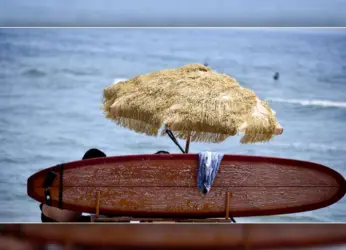 Thatched Umbrellas Put Up At RK Beach