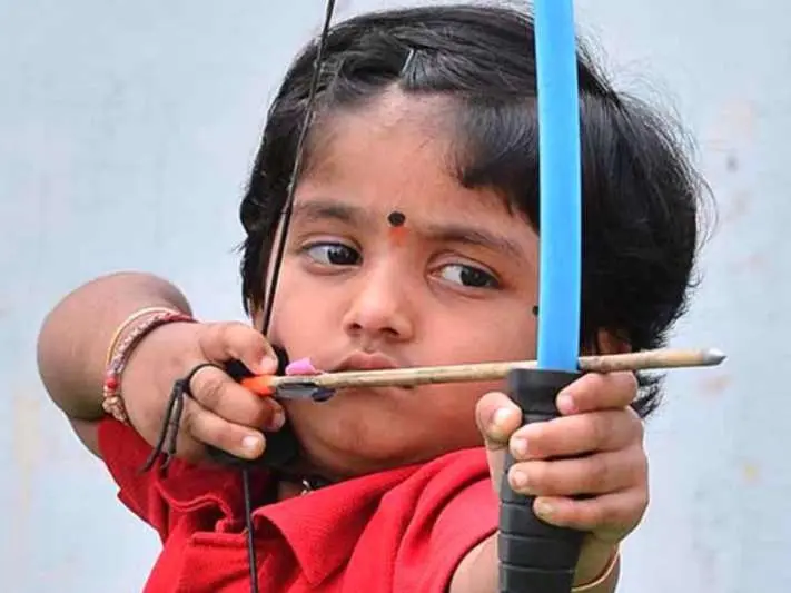 Record breaker Andhra Girl aiming at us with her cuteness - Archery