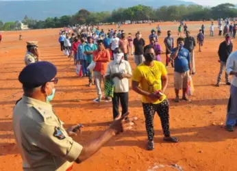 See Pics: People follow social distancing while procuring groceries in Vizag