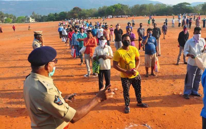 See Pics: People follow social distancing while procuring groceries in Vizag