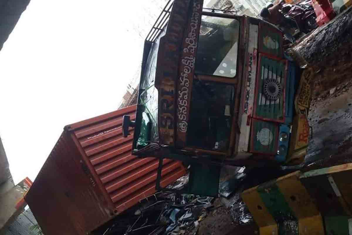 Container lorry topples on auto rickshaw near NAD flyover in Visakhapatnam