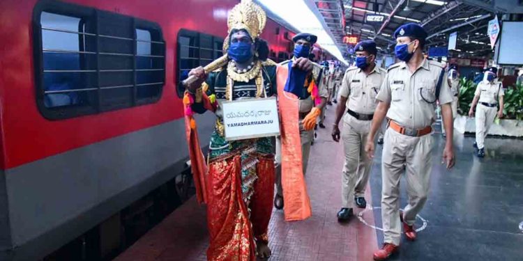 Yamraj patrols Vizag Railway Station to spread awareness on COVID-19