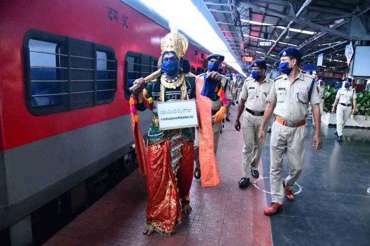 Yamraj patrols Vizag Railway Station to spread awareness on COVID-19