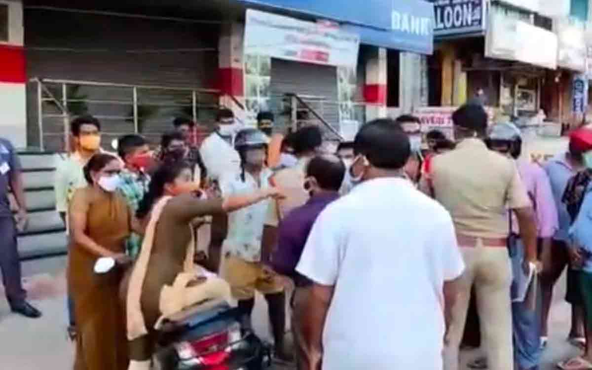 Woman argues with Visakhapatnam police for imposing fine during curfew