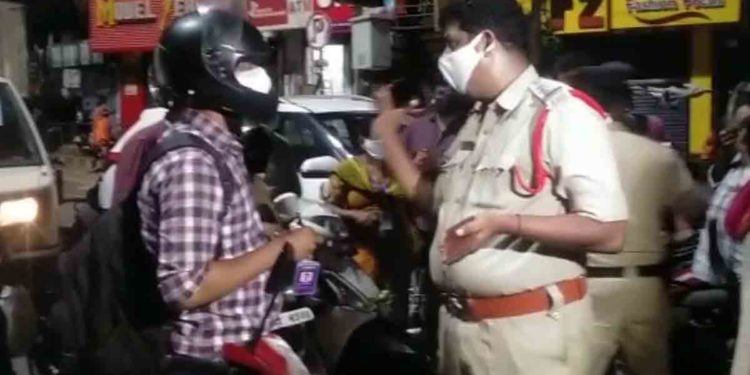 Visakhapatnam traffic police coming down on curfew violators in the city
