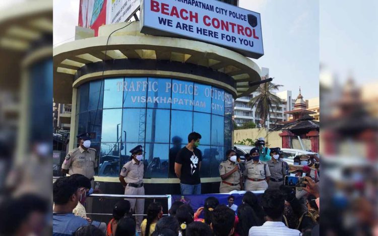 Adivi Sesh demonstrates the Disha App at RK Beach in Visakhapatnam