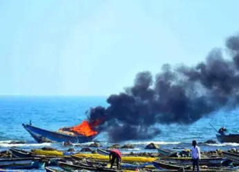 Fishing boats set on fire in Vizag due to clash between fishermen