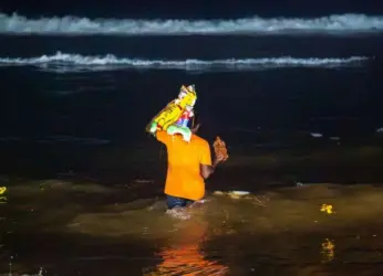 Vizag celebrates Ganesh Nimarjan at RK Beach, see the pics here!