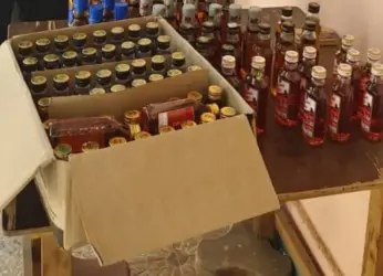 Two held on charge of running belt shops