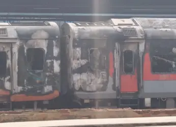 One dies as two coaches of train catch fire