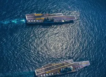 India’s indigenous aircraft carrier INS Vikrant arrives in Vizag ahead of IFR 26